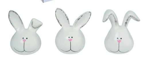 Three white bunny face plush toys with black eyes and pink noses on a white background.