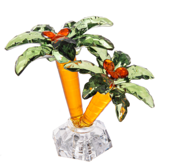 Crystal palm tree figurine with a clear base on a white background