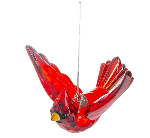 Red glass cardinal bird ornament on a white background