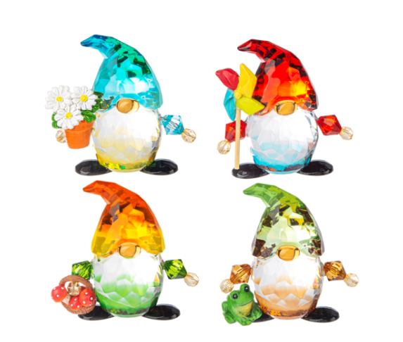 Set of colorful glass gnome figurines on a white background
