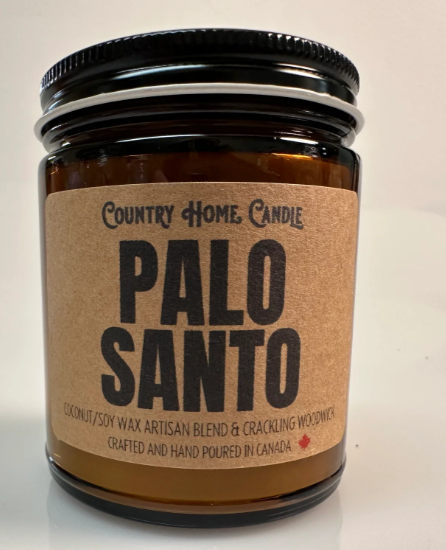 Candle jar labeled 'Palo Santo' with a brown label on a white background