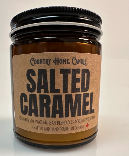 Jar of 'Salted Caramel' candle with a brown label on a white background