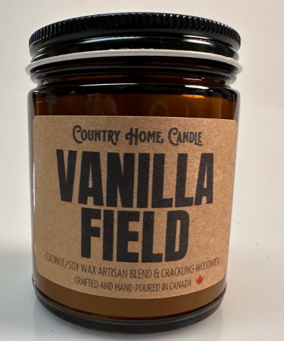Candle jar labeled 'Vanilla Field' by Country Home Candle on a white background