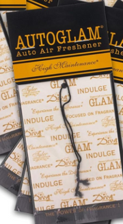 Packaging of Tyler Auto Glam Car Air Freshener with luxurious gold and black design, featuring text and brand branding.