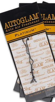 Packaging of Tyler Auto Glam Car Air Freshener with luxurious gold and black design, featuring text and brand branding.