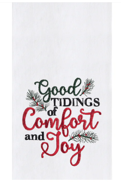 White towel with 'Good Tidings of Comfort and Joy' text and Christmas tree branches on a white background