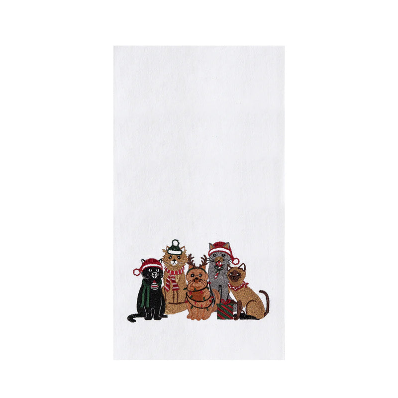 Five cats wearing Christmas hats towel on a white background