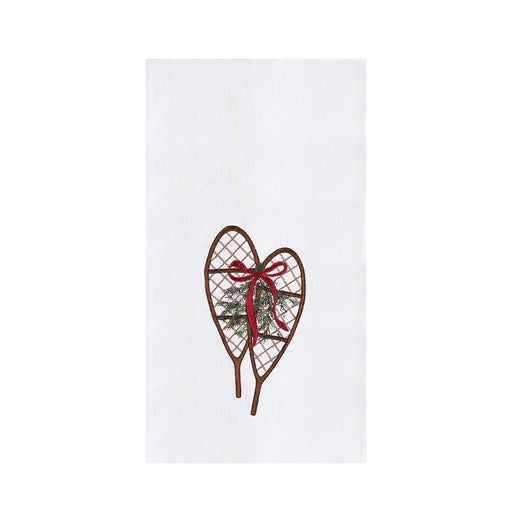 Heart-shaped snowshoe with a red bow on a white background