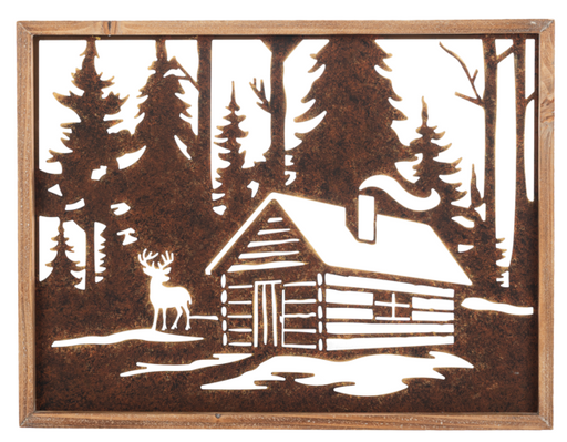 Metal wall art of a cabin and deer in a forest design.