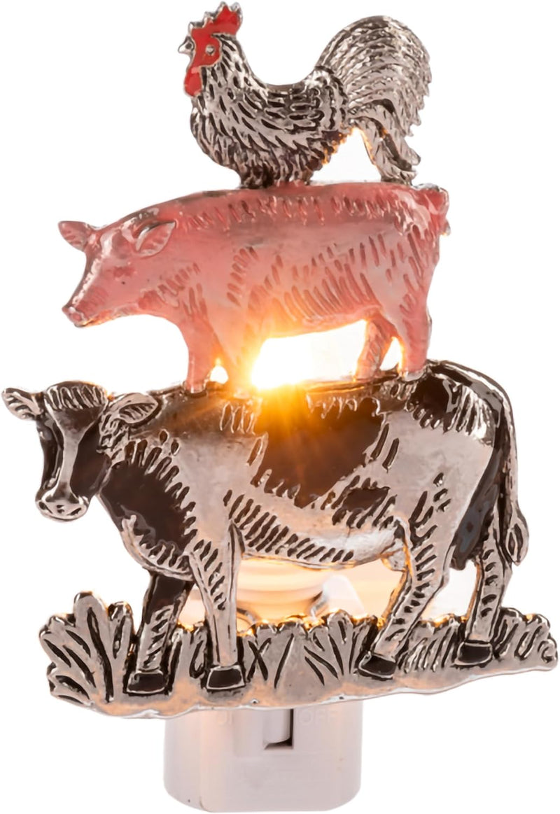 Decorative night light with animal figures including a cow, pig, and rooster on a white background.