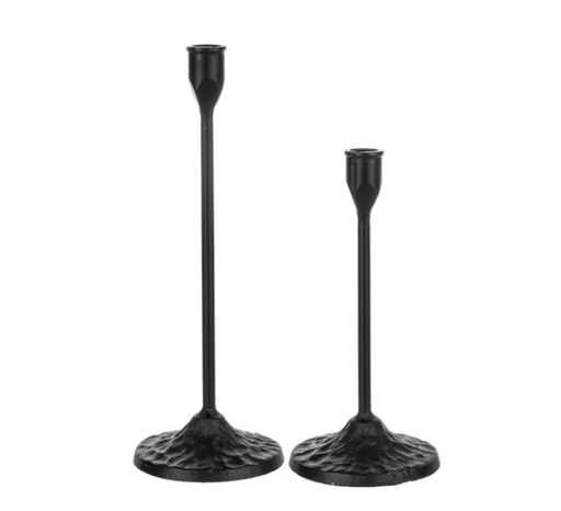 Two black candle holders on a white background