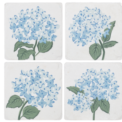 Four ceramic coasters with blue hydrangea flower design on a white background
