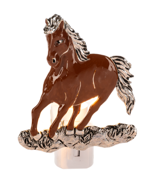 Horse-shaped night light on a white background