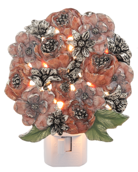 Decorative night light with floral design on a white background