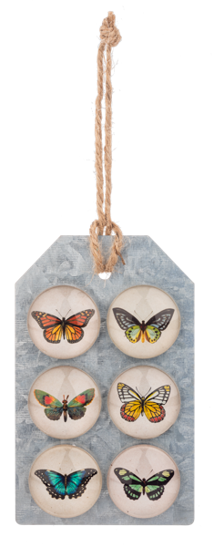 Set of six butterfly-themed glass magnets  on a decorative tag with a rope.