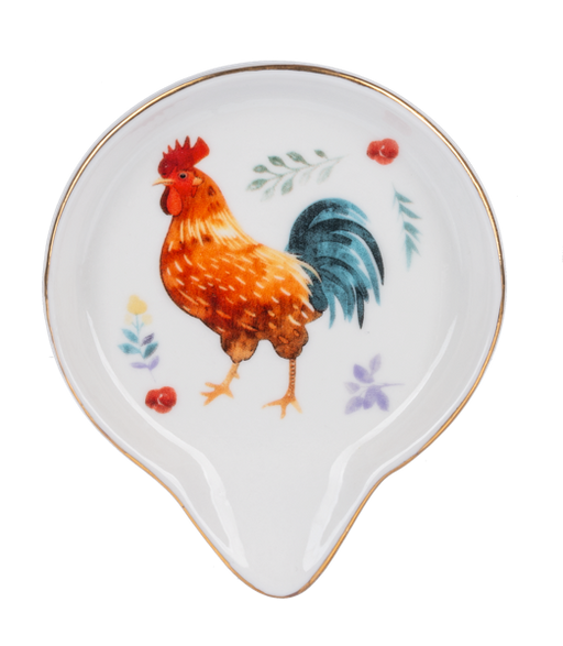 Decorative spoon rest with a rooster design on a white background