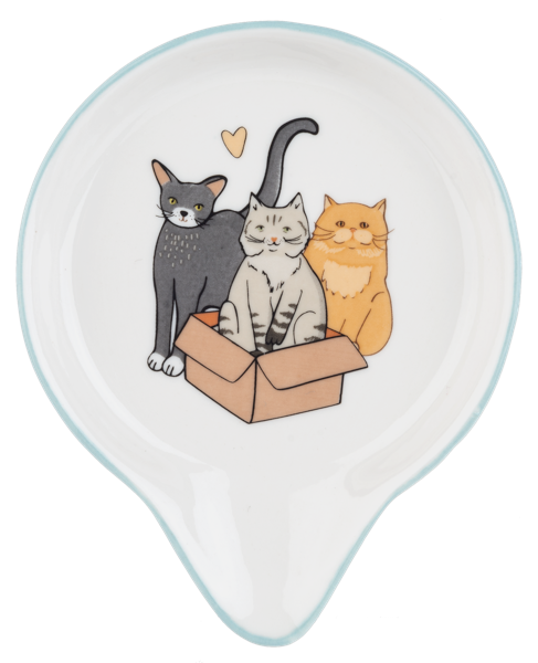Spoon rest with cartoon cats design on a white background