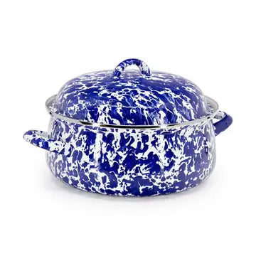 Blue and white speckled enameled cast iron cookware on a white background