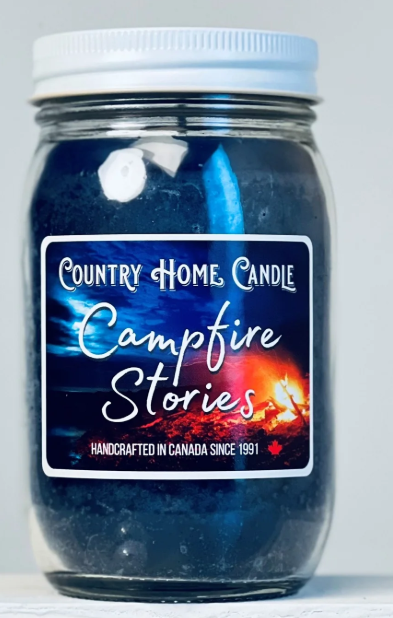 Jar of Country Home Candle labeled 'Campfire Stories' on a white background
