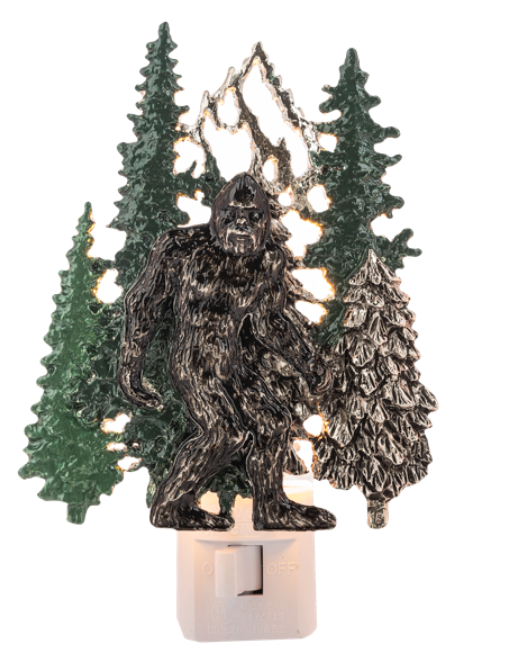 Sasquatch night light with trees in the background