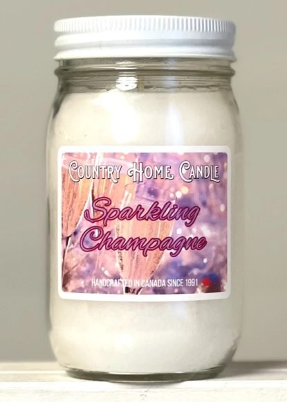 Jar of 'Sparkling Champagne' candle by Country Home Candle on a neutral background