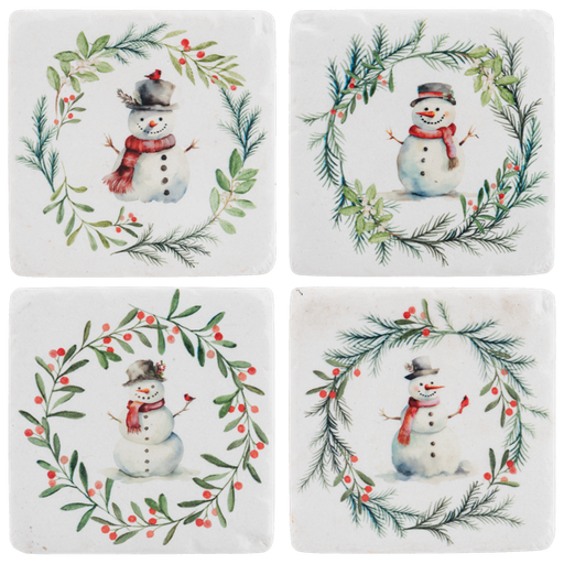 Four coasters with snowman designs surrounded by greenery and berries on a white background.
