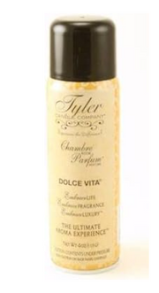 A bottle of 'Chambre Parfum' room perfume by Tyler Candle Co. with the label indicating it is the French Market fragrance.