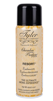 A bottle of 'Chambre Parfum' room perfume by Tyler Candle Co. with the label indicating it is the French Market fragrance.