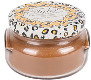 Tyler candle with leopard print lid on a white background