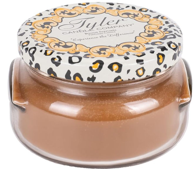 Tyler candle with leopard print lid on a white background