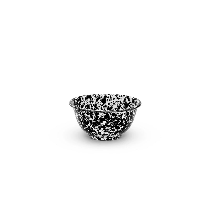 A black and white marble splattered small footed enamel bowl.
