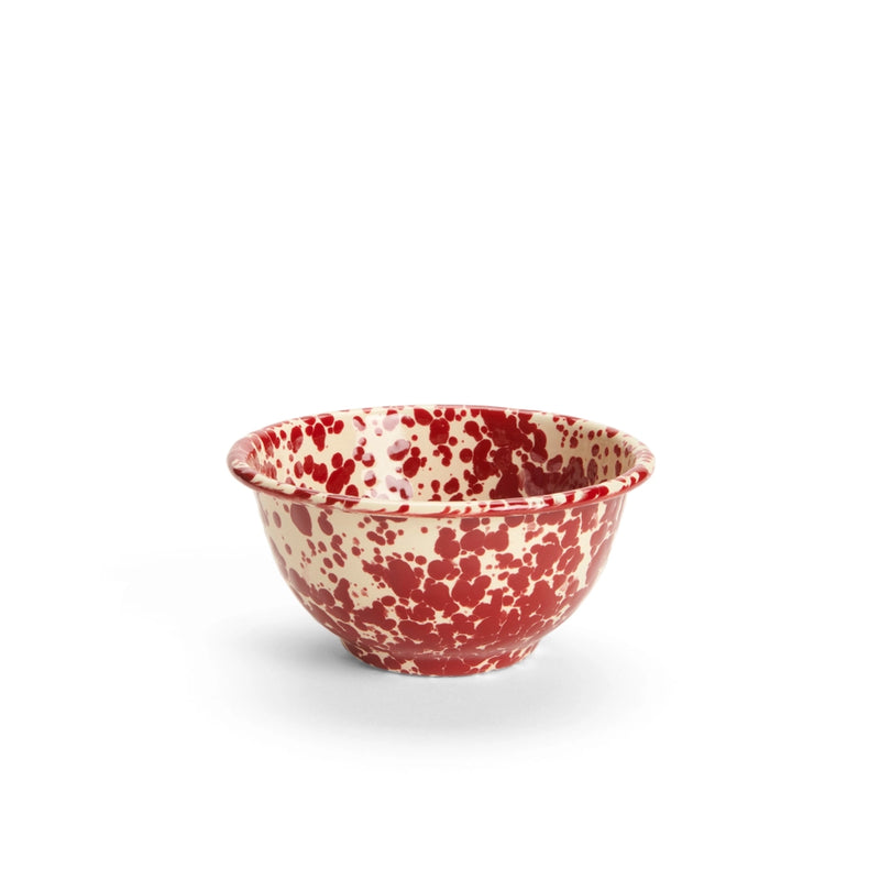 A burgundy and white marble splattered small footed enamel bowl.