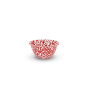 A red and white marble splattered small footed enamel bowl.