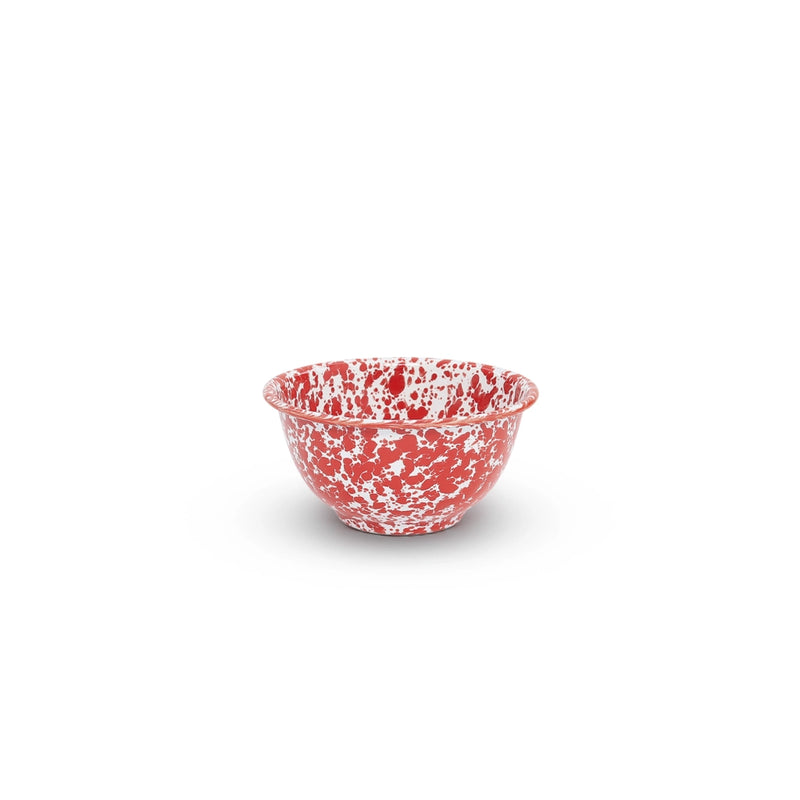 A red and white marble splattered small footed enamel bowl.
