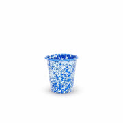 Blue speckled cup on a white background