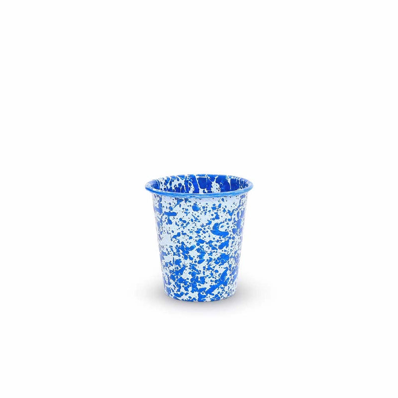 Blue speckled cup on a white background