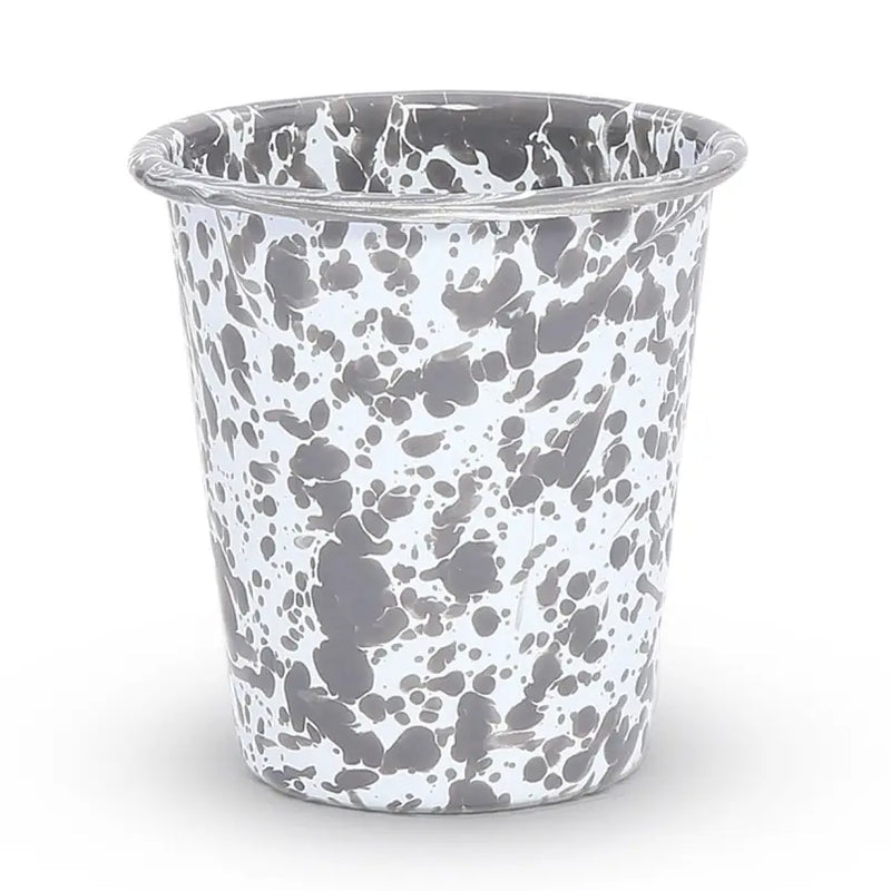Speckled gray and white cup on a white background