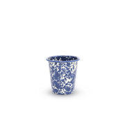 Blue and white speckled cup on a white background