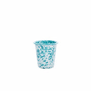 Turquoise and white patterned cup on a white background
