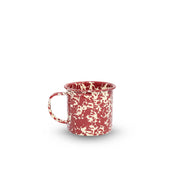 Red ceramic mug with white speckles on a white background