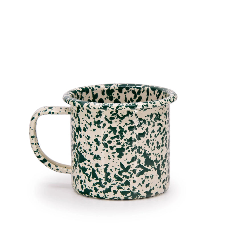 Speckled green and white mug on a white background