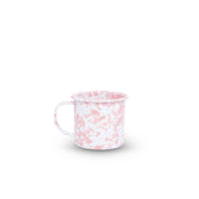 White mug with pink floral pattern on a white background