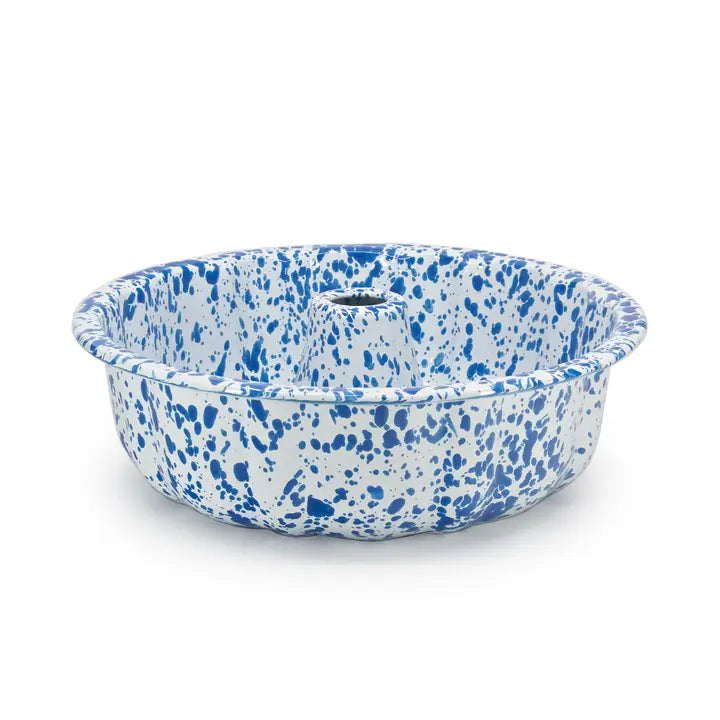 Blue and white speckled enamel bowl on a white background