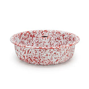 Red speckled enamel baking dish on a white background