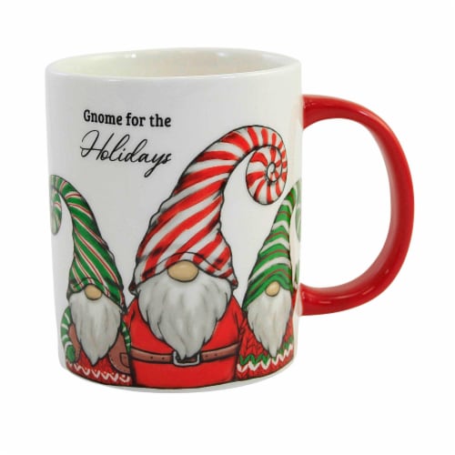 Mug with Christmas-themed gnomes and candy canes on a white background