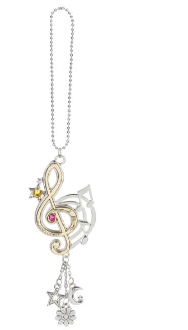 Decorative keychain with musical note design on a white background