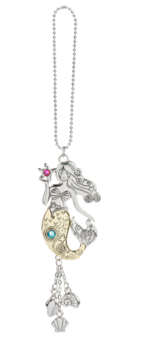 Decorative keychain with seahorse design on a white background