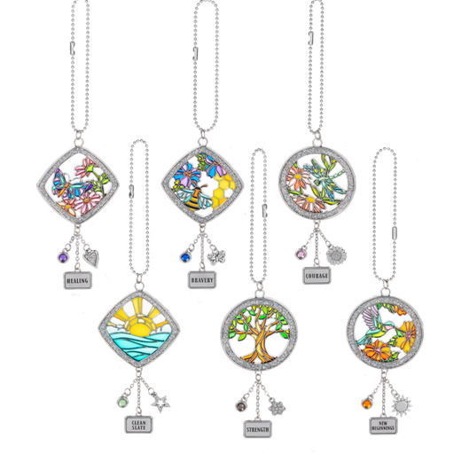 Set of colorful car charms with various designs on a white background