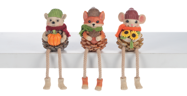 Three decorative mice figurines with autumn-themed accessories on a white background