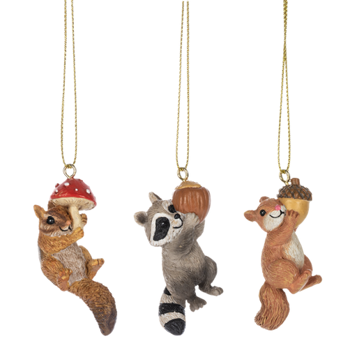 Three animal-themed Christmas ornaments hanging from gold chains on a white background.
